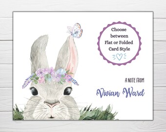 May include: A watercolor illustration of a gray bunny wearing a floral crown and a butterfly on its ear. The card includes the text "Choose between Flat or Folded Card Style" and "A note from Vivian Ward."