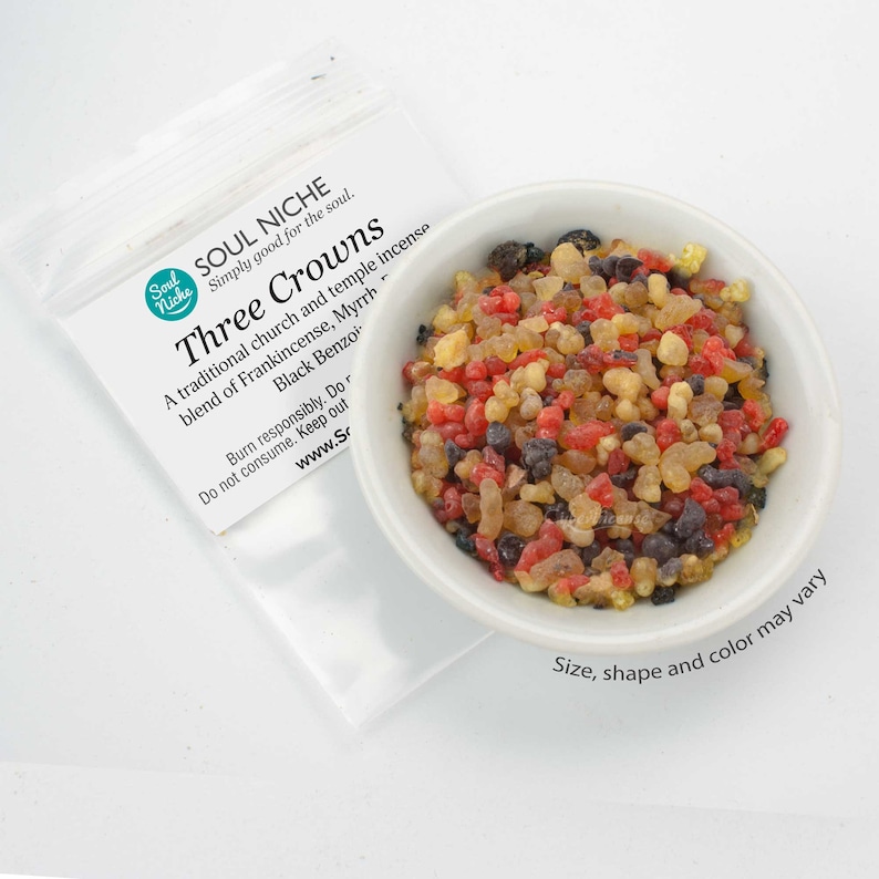 May include: A white bowl filled with a blend of frankincense, myrrh, and black benzoin incense. The incense is a mix of red, brown, and black resin pieces. The bowl is on a white surface. The text on the bag reads "Soul Niche Simply good for the soul. Three Crowns A traditional church and temple incense blend of Frankincense, Myrrh Black Benzoin Burn responsibly. Do not consume. Keep out www.Sr Size, shape and color may vary"