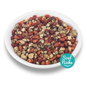 May include: A white bowl filled with a mix of golden and reddish-brown granules. The granules have a textured appearance, with some pieces appearing metallic. A teal circle with the text "Soul Niche" is in the lower right corner.