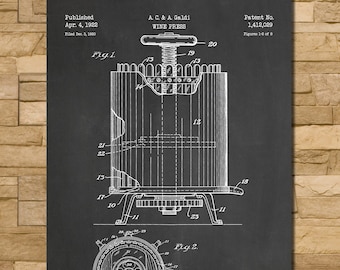 May include: Chalkboard print of a wine press patent illustration. The black and white drawing shows the internal mechanics of the press, with labels and diagrams. The text includes the names A.C. & A. Galdi, and the patent number.