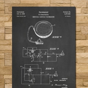 May include: A black and white diagram of a medical cardiac pacemaker, with the text "Pacemaker" and "Medical Cardiac Pacemaker". The diagram includes a detailed illustration of the device's internal components and circuitry, with the word "Chalkboard" at the bottom.