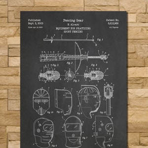 May include: Black and white illustration of a fencing gear patent drawing. The drawing shows a fencing mask, a fencing sword, and a fencing jacket. The patent number is 6,612,968. The text "Fencing Gear" and "Equipment for Practicing Sport Fencing" is also included in the drawing.