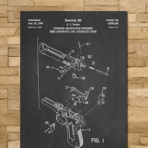 May include: A chalkboard-style print of a Beretta M9 firearm diagram. The diagram shows the firearm's components and is labeled with text including the patent number and the phrase "Firearm Selectable Between Semi-Automatic and Automatic Mode."