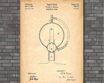 May include: A black and white line drawing of Thomas Edison's patent for an electric lamp, also known as a light bulb. The patent was published on April 5, 1881, and the patent number is 239,745. The drawing shows a cross-section of the light bulb with the filament and the glass bulb.