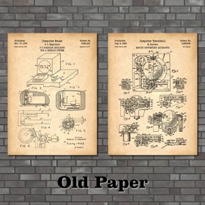 May include: Two vintage patent drawings for computer input devices. The left drawing shows a computer mouse with the text "Computer Mouse" and "X-Y Position Indicator for a Display System". The right drawing shows a computer trackball with the text "Computer Trackball" and "Motion Converting Apparatus".