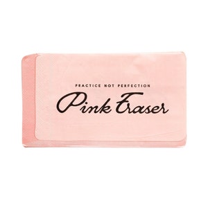 May include: A rectangular pink eraser with the words "Pink Eraser" in a cursive font and the phrase "PRACTICE NOT PERFECTION" in a smaller font. The eraser has a light pink hue and a textured surface.