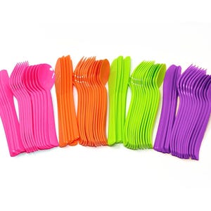 May include: A set of 40 plastic utensils in four colors: pink, orange, green, and purple. The utensils include forks, spoons, and knives.