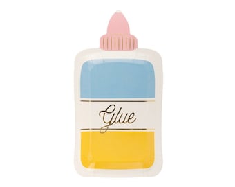 May include: A white paper party plate shaped like a glue bottle with a pink lid, blue body, and yellow bottom. The word "Glue" is written in gold lettering on the front.