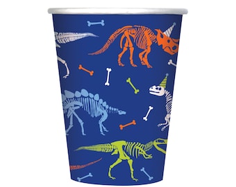 May include: Blue paper cups with a dinosaur skeleton pattern. The skeletons are in shades of blue, green, and orange. There are also white bones scattered around the cups.