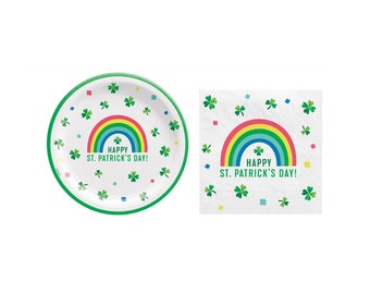 May include: A set of paper plates and napkins with a rainbow and shamrock design. The plates and napkins feature the text "Happy St. Patrick's Day!"