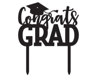 May include: Black cake topper with the text "Congrats Grad" and a graduation cap.