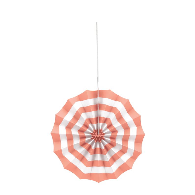 May include: A pink and white striped paper fan decoration hanging from a white string. The fan is folded in a circle shape.