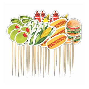May include: A set of 24 colorful food-themed cupcake toppers. The toppers feature images of hot dogs, hamburgers, corn on the cob, olives, pickles, ketchup, and mustard. The toppers are attached to wooden skewers.