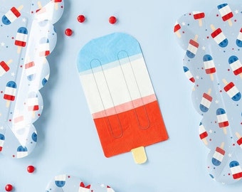 May include: Red, white, and blue popsicle design paper plates. The plates have a scalloped edge and feature a repeating pattern of popsicles with stars.