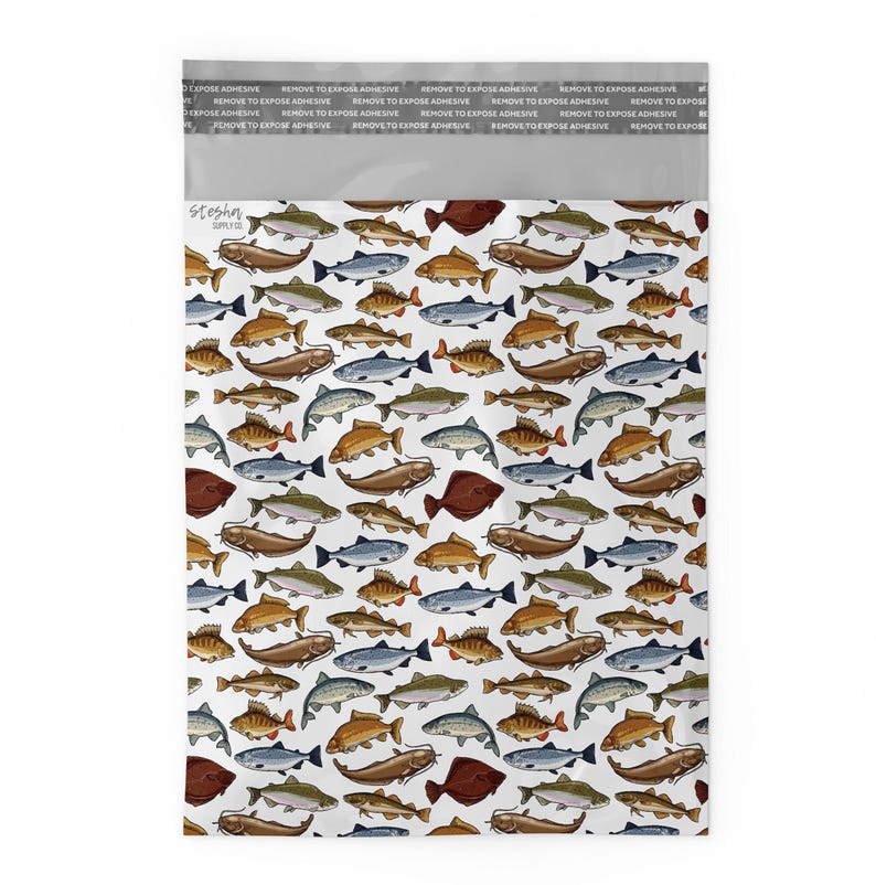 May include: A white background with a repeating pattern of various types of fish in different colors, including brown, blue, green, and orange. The fish are all facing different directions and are arranged in a random pattern.