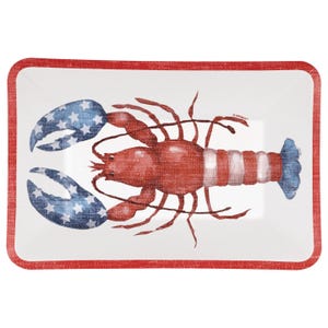 May include: Rectangular serving tray with a red and white lobster illustration. The lobster's claws are blue with white stars. The tray has a red border and is perfect for serving appetizers or snacks.