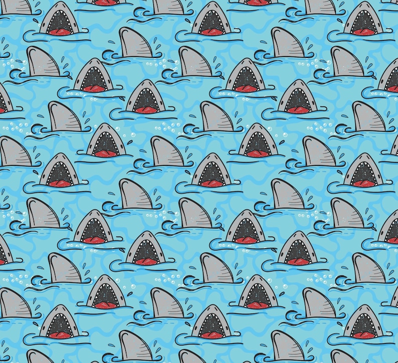 May include: A repeating pattern of cartoon sharks with open mouths on a light blue background. The sharks are gray with white outlines and are swimming in a wavy pattern.