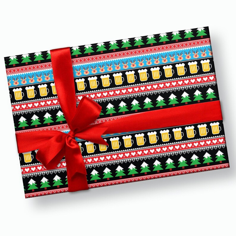 May include: A red and white gift box with a black and white Christmas pattern featuring reindeer, beer mugs, and Christmas trees. The box is tied with a red ribbon.
