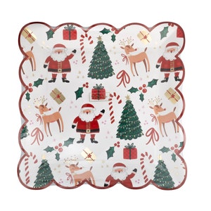 May include: White paper party plates with a scalloped edge and a festive Christmas design. The plates feature a repeating pattern of Santa Claus, reindeer, Christmas trees, candy canes, and presents. The background is white with gold glitter accents.