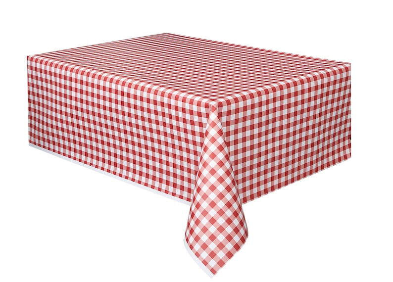 May include: Red and white gingham tablecloth. The tablecloth is made of plastic and has a white border.
