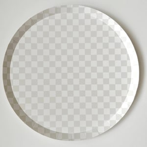 May include: A white paper plate with a scalloped edge.