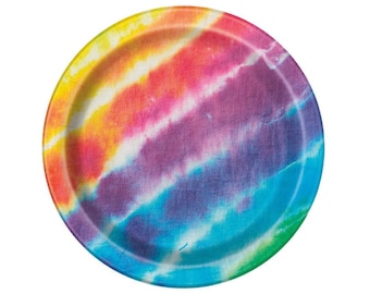 May include: A colorful tie-dye design paper plate. The plate is round and has a white background with streaks of yellow, orange, red, purple, blue, and green.