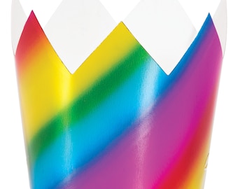 May include: A rainbow-colored paper crown with a pointed top and a scalloped edge. The crown is made of cardboard and has a shiny finish.