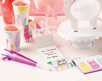 May include: A llama-themed party invitation with a pink, white, and green color scheme. The invitation includes a llama with a party hat and the text "Ava's Birthday, June 6th, 4:00 p.m., Our House". There is also a separate card that says "You're Invited" with colorful tassels.