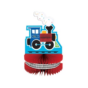 Puede incluir: Una locomotora de tren azul y roja con una columna de humo blanca y el texto "No. 1" en el lateral. El tren está sobre un centro de mesa de papel de panal rojo y blanco.