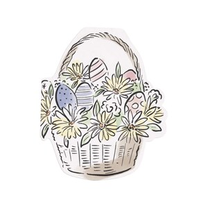 May include: A white wicker basket filled with colorful Easter eggs and yellow flowers. The basket has a brown handle and is surrounded by green leaves.