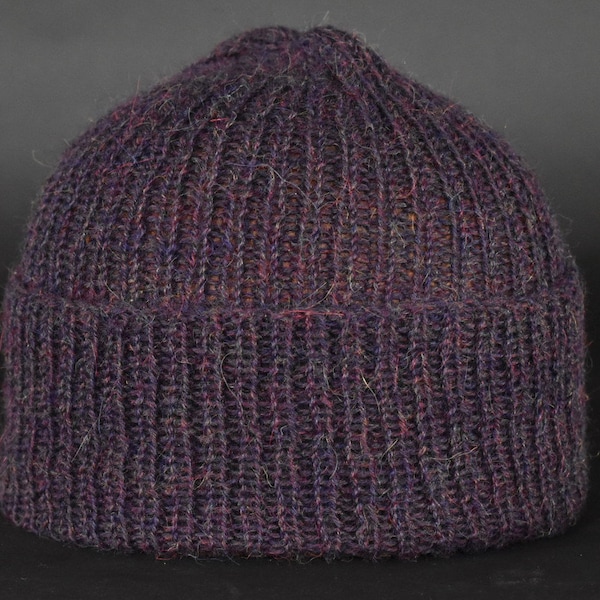 pure alpaca,with a tweed effect,plum colour with navy blue flashes ,ultimate hygge.