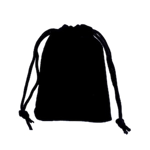 May include: A black velvet drawstring bag with a rounded bottom. The bag has a simple design and is closed with a black drawstring. The bag is made of a soft, plush material.
