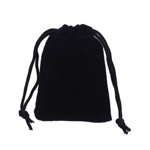 May include: A black velvet drawstring bag with a black cord.