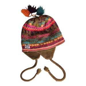 May include: A knitted winter hat with ear flaps and a colourful geometric pattern in shades of brown, pink, teal, and orange. The hat has a braided tie and is topped with three tassels.