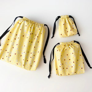 Yellow drawstring bag set of 3 - washable organic cotton bag
