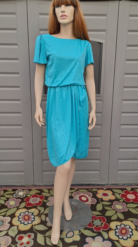 turquoise peplum dress Strapless Layered Peplum Detail Long Mermaid Gown