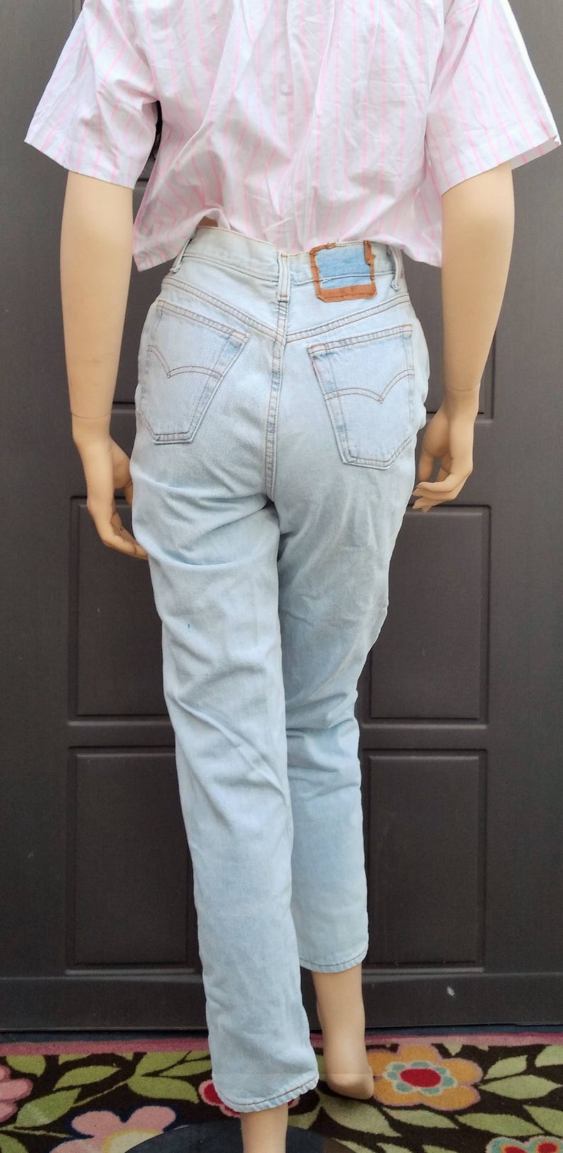 high waisted light wash levis