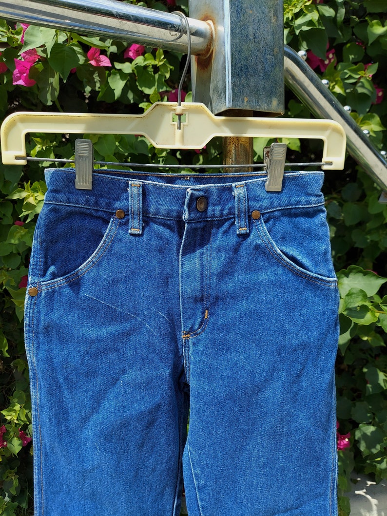 Vintage 70's Wrangler denim jeans kids jeans boys and girls jeans ..22x23.....22 in waist image 4