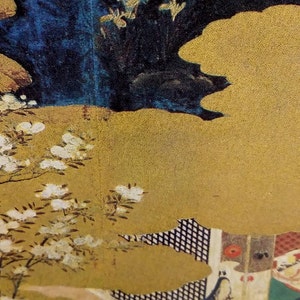May include: A vintage Japanese painting depicting a woman in a colorful kimono sitting on a platform with a lattice screen behind her. The woman is surrounded by white flowers and a dark blue cloud in the background.