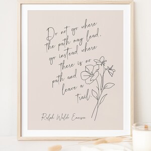 May include: A printable quote by Ralph Waldo Emerson on a light pink background. The quote reads: "Do not go where the path may lead. Go instead where there is no path and leave a trail."