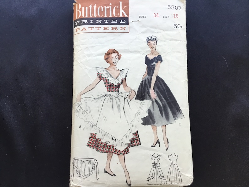 deep ruffled d\u00e9collet\u00e9 neckline ruffled apron. Full skirt Vintage 1950 misses\u2019 swirl skirted dress with apron Butterick pattern 5507