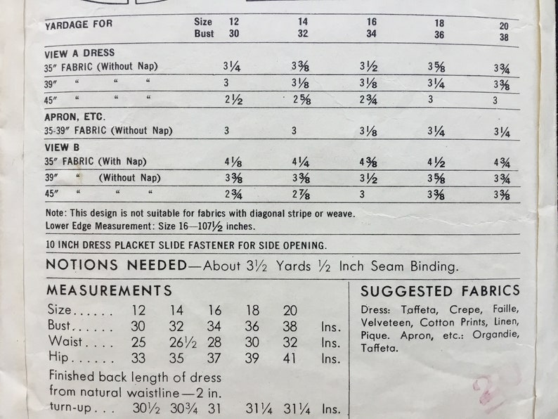 deep ruffled d\u00e9collet\u00e9 neckline ruffled apron. Full skirt Vintage 1950 misses\u2019 swirl skirted dress with apron Butterick pattern 5507