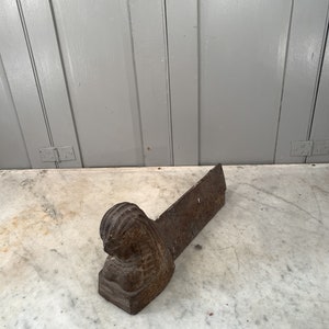 Antique French cast iron Egyptian style firedog