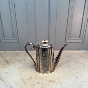 Antique silver plated elegant engraved coffee pot