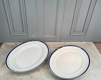 Pair of antique Victorian plain ceramic oval meat plates with blue rims