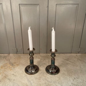Pair of antique silver plated candlesticks