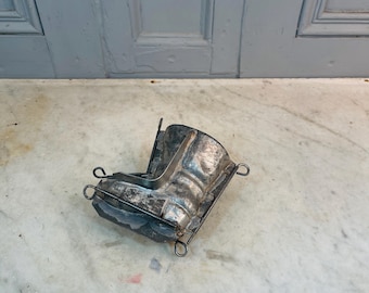 Antique French chocolate mould in the shape of a boot