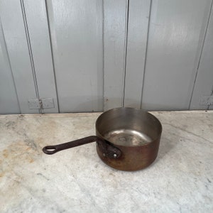Antique French copper medium size saucepan with cast iron handle