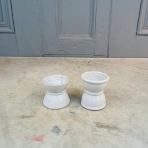 Couple antique French ceramic egg cups