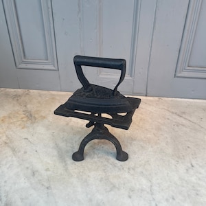 Antique traditional cast iron flat iron with adjustable stand
